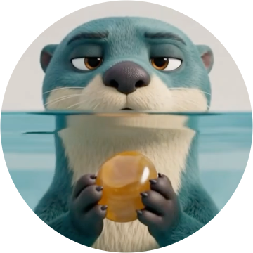 Otto, the MORPH otter, holding his amber stone.